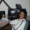 Kathy behind the board hosting Gospel Groove